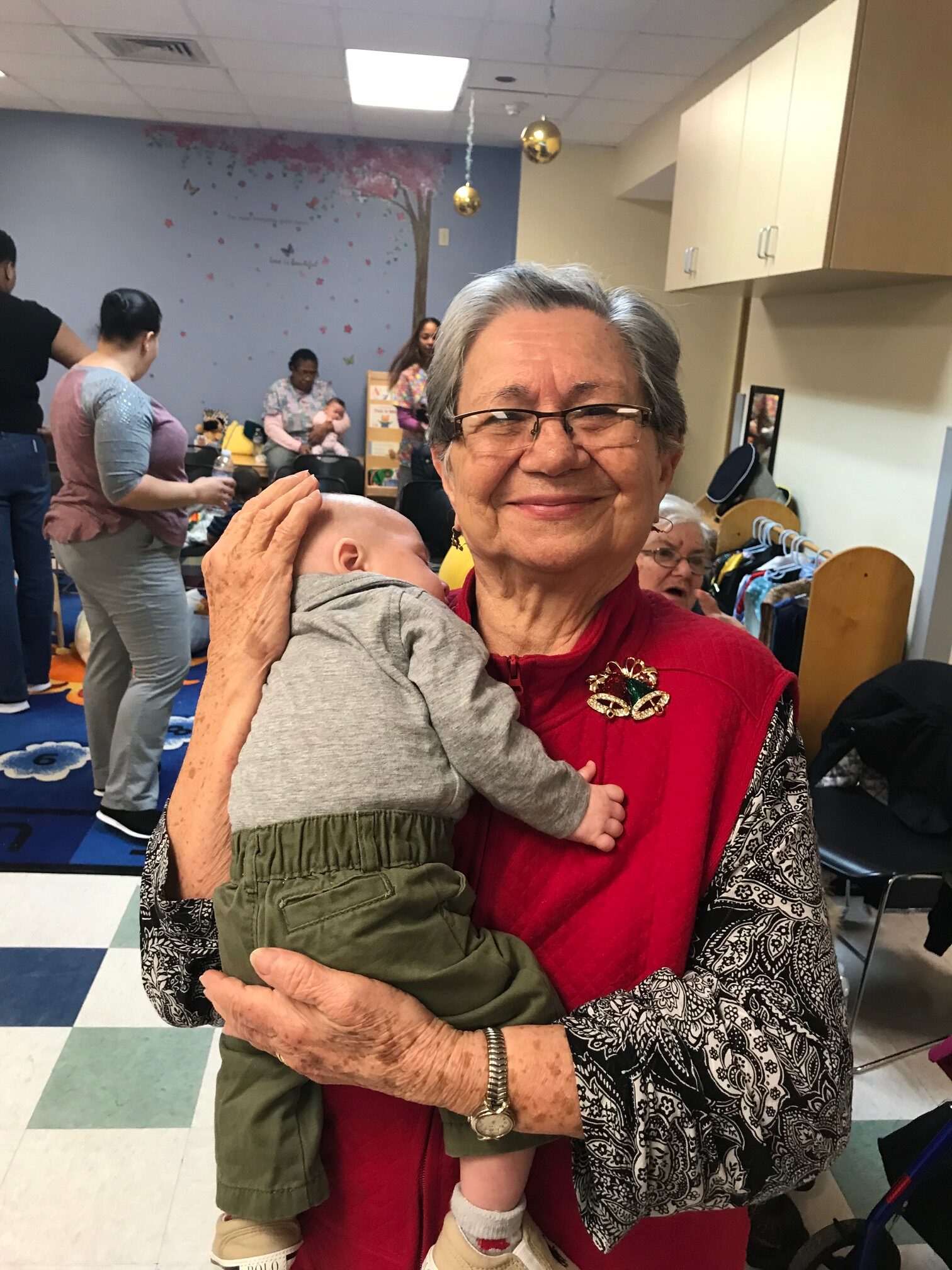 Senior with baby at YMP